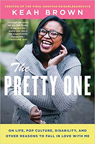 Cover of The Pretty One. Keah is a black woman wearing a gray sweater. She is smiling and has glasses on. 